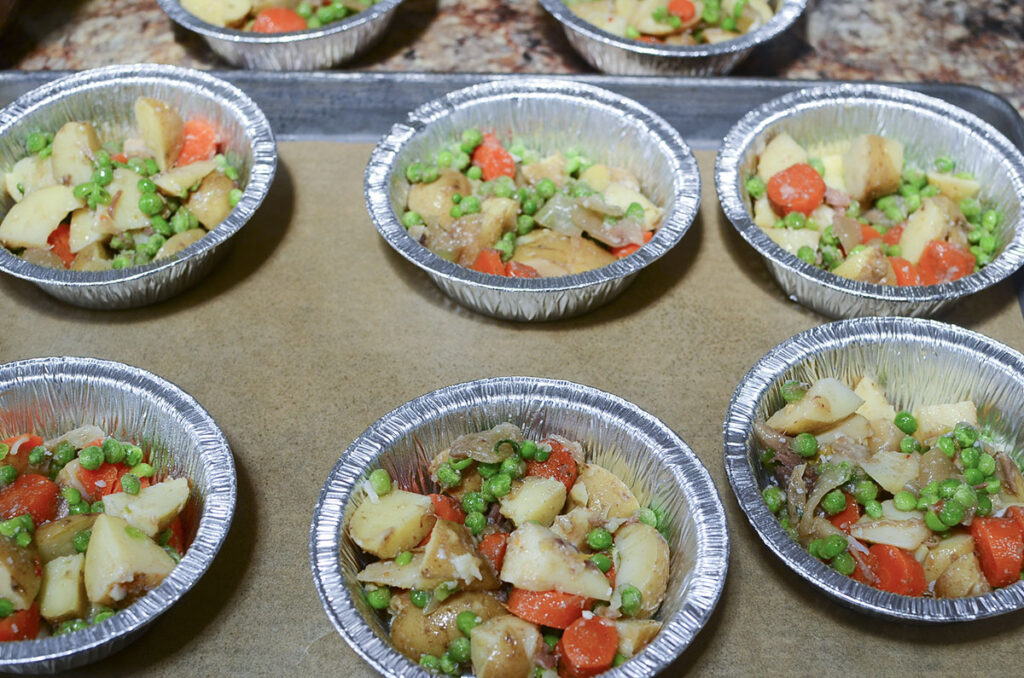 Leftover veggies added to the the foil containers.