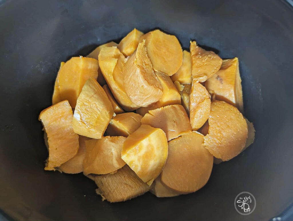 Cooked sweet potato in the slow cooker.
