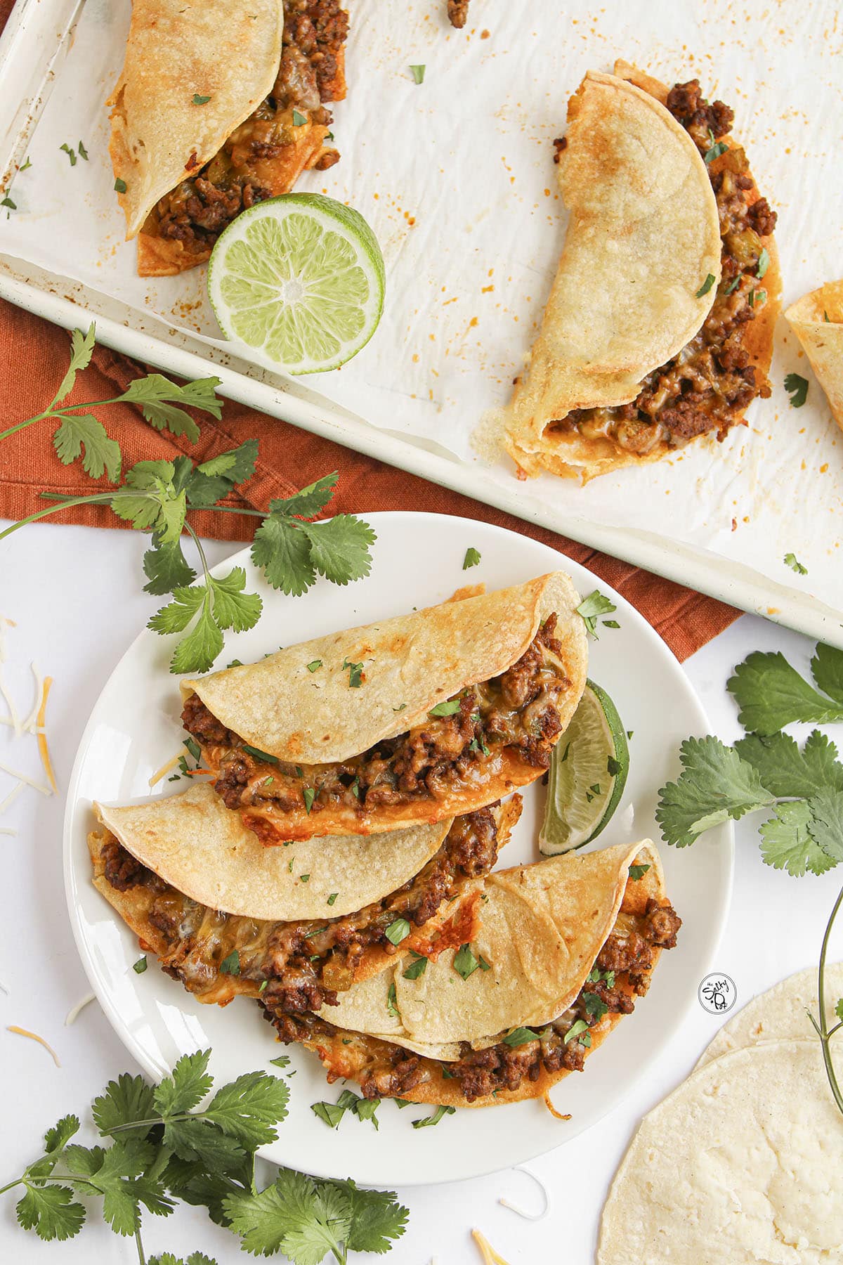Oven baked beef tacos for small families topped with fresh toppings