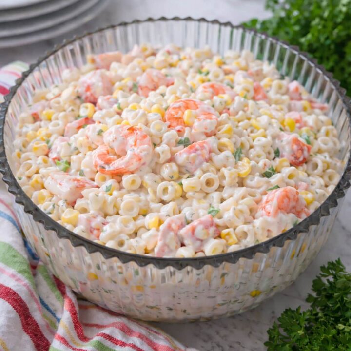 Seafood Salad in a bowl with a colorful napkin on the left.