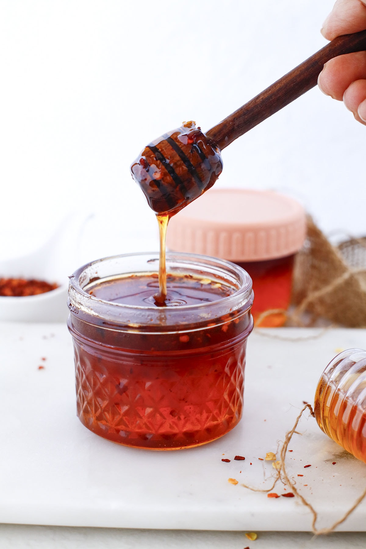 Honey honey with a honey spoon at the top.