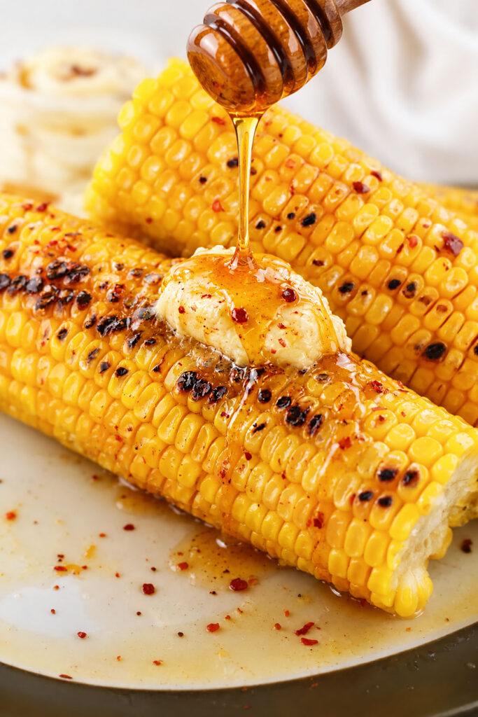 Hot honey corn on the cob featured image.